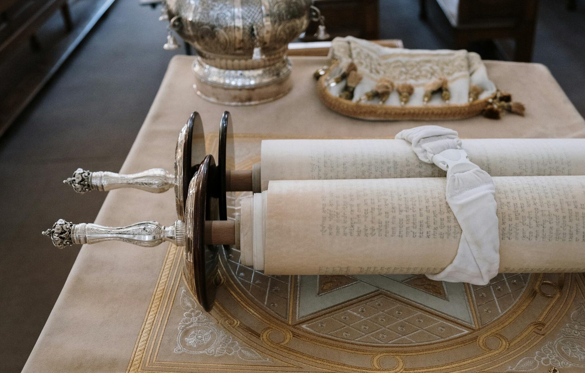 a sefer torah on a table
