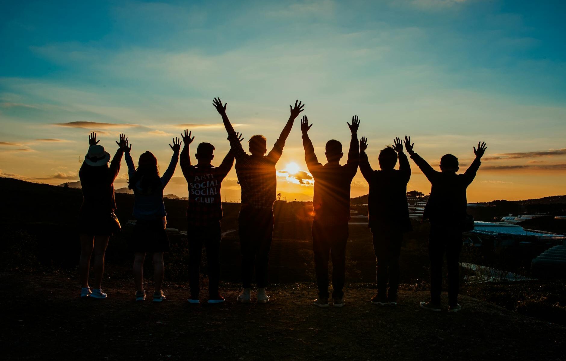 people silhouette during sunset