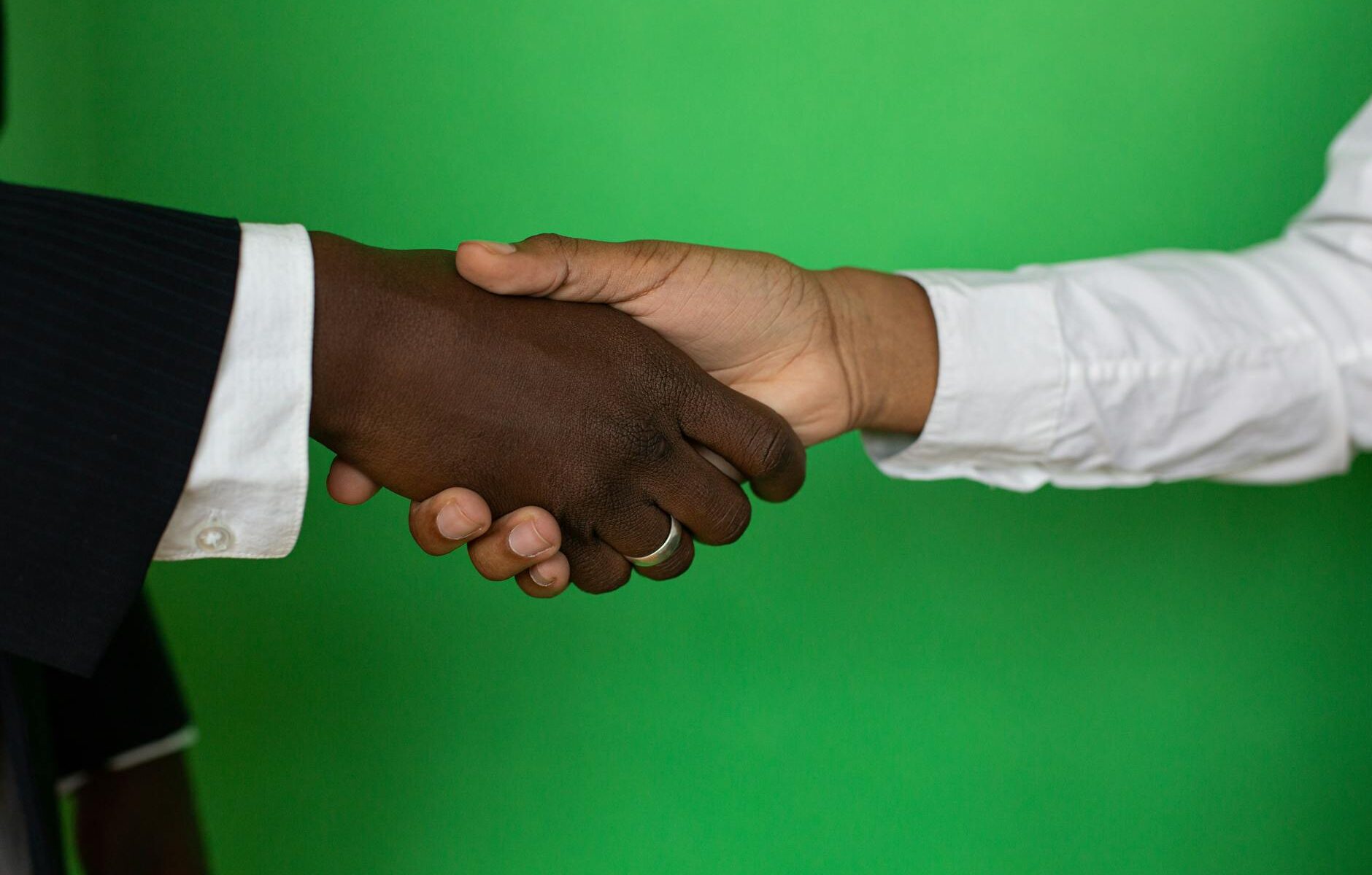 close up photo of shaking hands